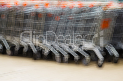 Horizontal supermarket cart bokeh background