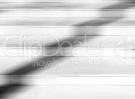 Horizontal black and white motion blur stairs background