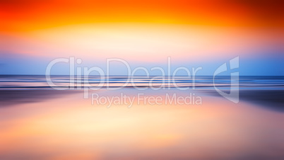 Horizontal ocean sunset blurred background