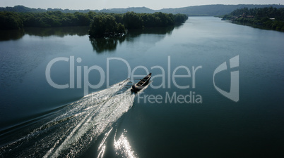 Indian boatman driving lake trace