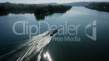 Indian boatman driving lake trace