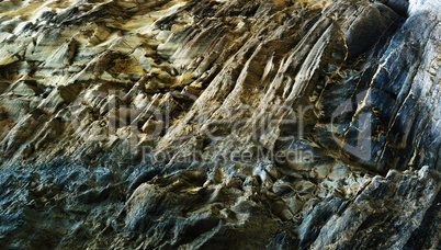 Horizontal vivid vibrant rock texture background backdrop