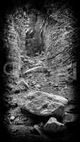 Vertical black and white landslide rock landscape