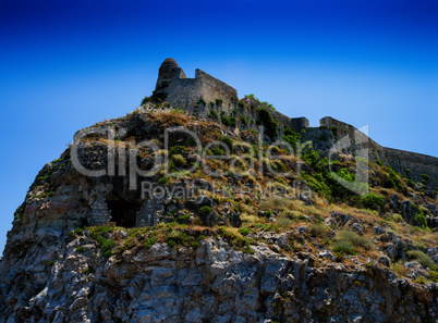 Horizontal vivid abandoned castle on the rock hill landscape bac