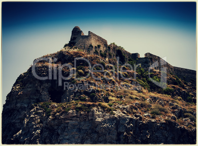 Horizontal vintage abandoned castle on the rock hill landscape p