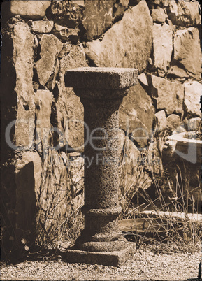 Vertical antique pedestal bokeh design postcard composition