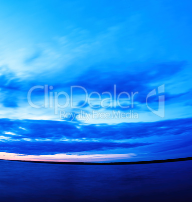 Vertical vivid super wide angle  ocean curved horizon with cloud