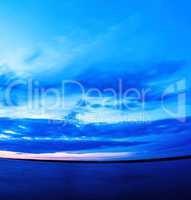 Vertical vivid super wide angle  ocean curved horizon with cloud