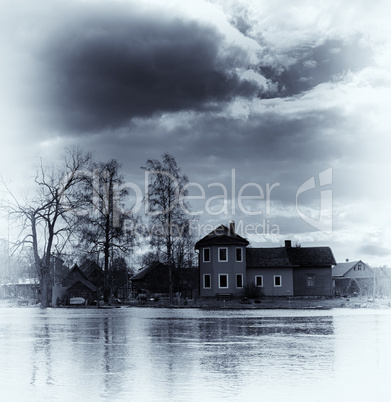 Vertical vintage vibrant blue sepia house on waters background b