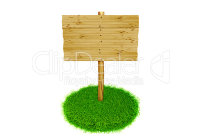 Advertising sign stands in fresh grass tufts