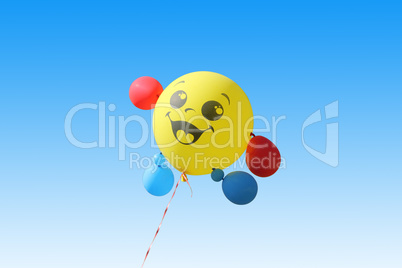 Yellow balloon flying on a blue sky background