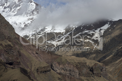 Clouds Flying Between Mountains