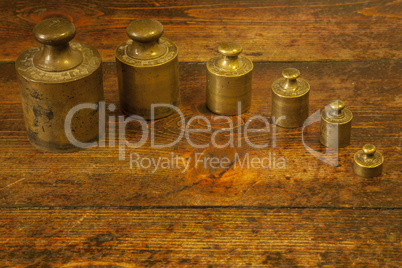 Different vintage brass weights unit