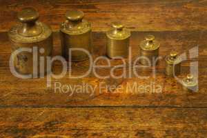 Different vintage brass weights unit