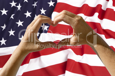 Hands heart symbol, USA flag