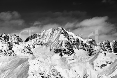 Black and white snowy mountains at sun day