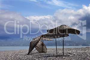Old sunshade on deserted beach