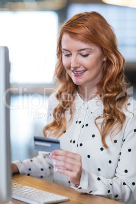 Businesswoman holding smart card