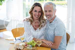 Happy mature couple in restaurant