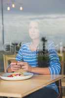 Woman holding mobile phone