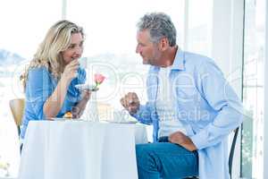 Mature couple having food