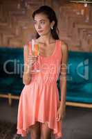 Beautiful woman holding a champagne flute