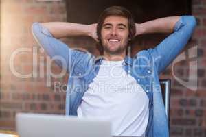 Businessman relaxing in office