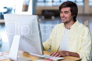 Businessman working on computer in office