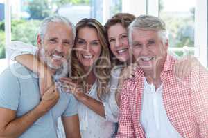 Cheerful mature couples in restaurant