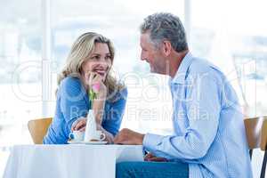 Romantic couple sitting in restaurant