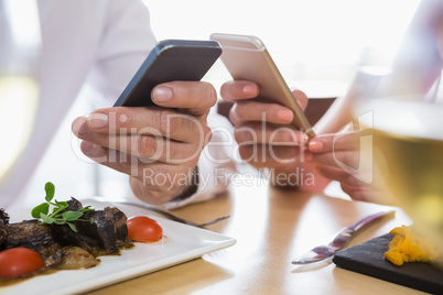 Couple using mobile