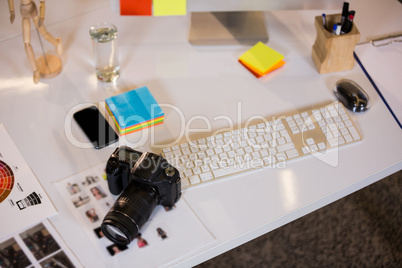 Camera by keyboard at desk