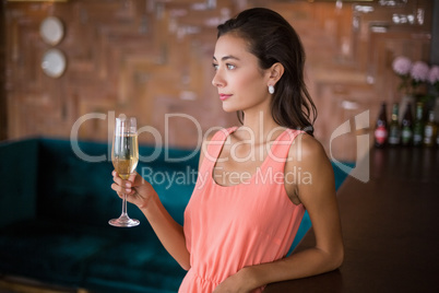 Beautiful woman holding a champagne flute