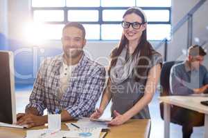 Business people at desk in office
