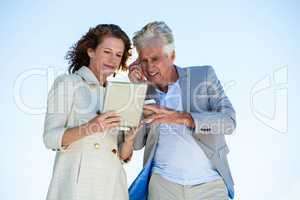 Man with woman talking on phone