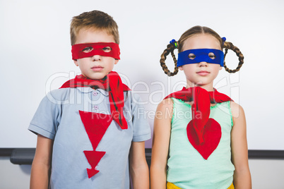 Boy and girl pretending to be a superhero