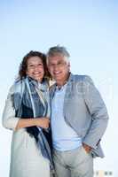 Portrait of happy couple standing