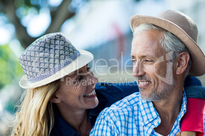 Happy mature couple in city