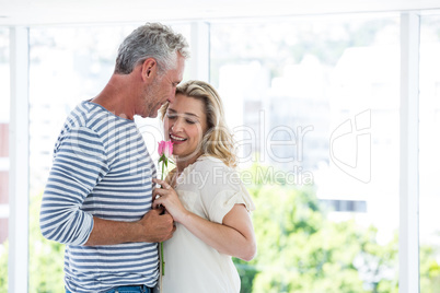 Romantic mature couple with rose