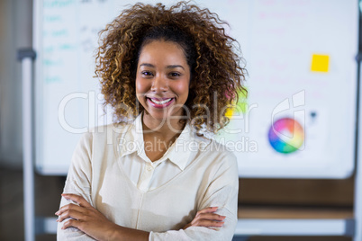 Portrait of woman standing against whiteboard Portrait of woman standing against whiteboard