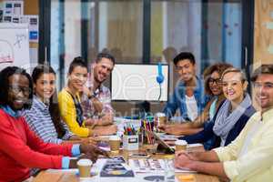 Young colleagues in meeting room