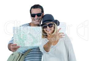 Cheerful mid adult couple taking selfie