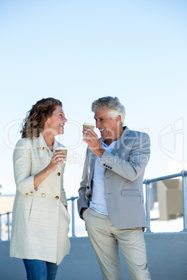 Happy couple enjoying coffee