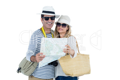 Front view of couple reading map