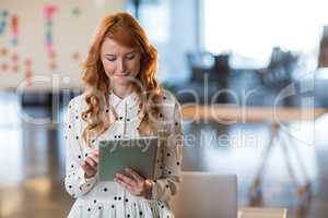 Woman using digital tablet