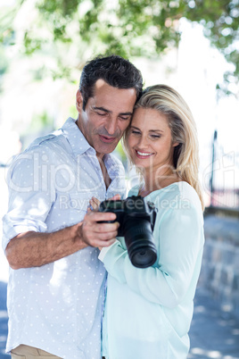 Cheerful couple looking in camera