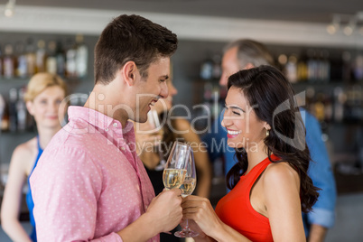 Couple toasting glass of champagne