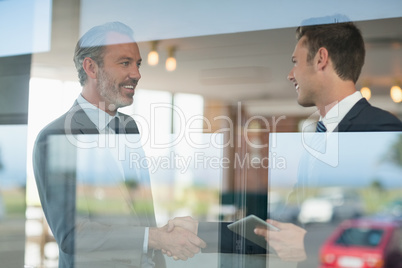 Businessmen shaking hands with each other