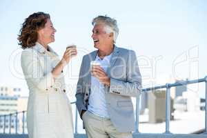 Happy couple enjoying coffee