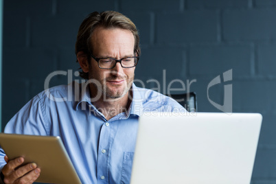 Man using laptop in office